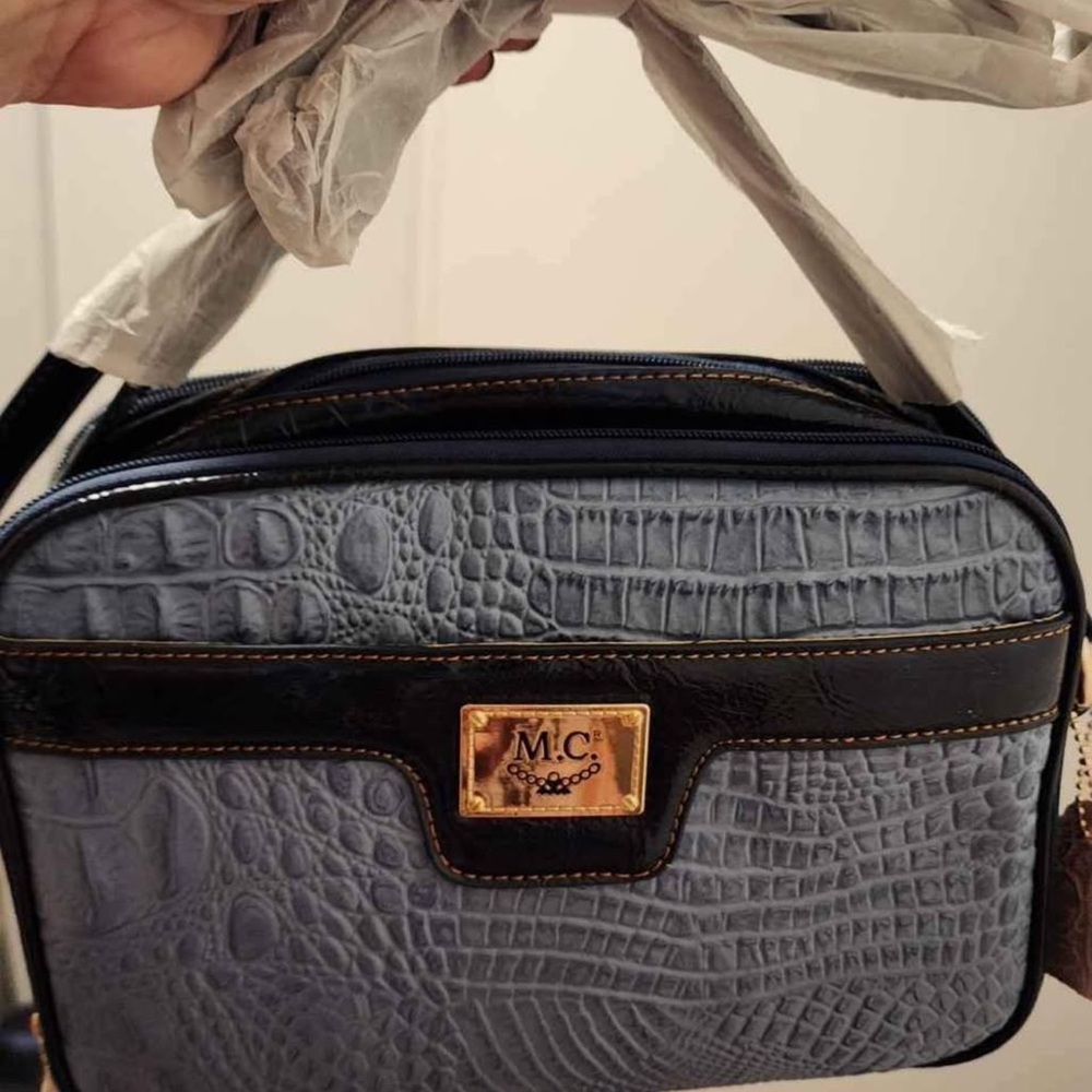 Madi Claire Blue and Black Crocodile Pattern Women’s Bag. Corn flower blue.